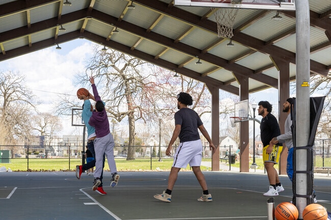 Locals from all over Prospect Hill-Back Bay make their way to O'Connell South Common to play a game of basketball.