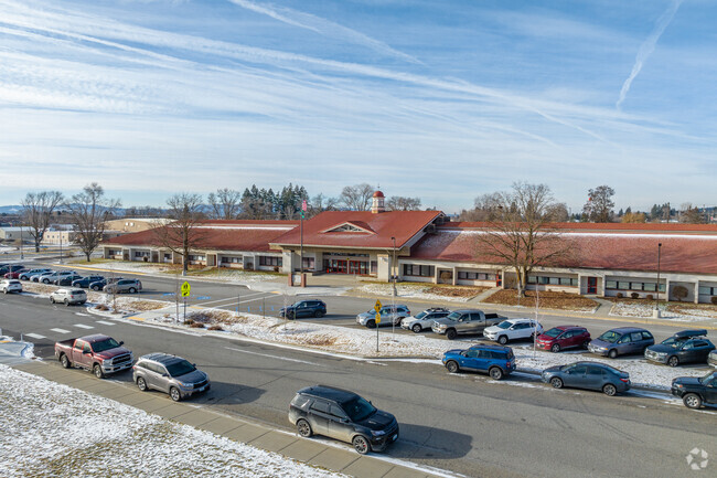 The Otis Orchard School sits next to several local shops.