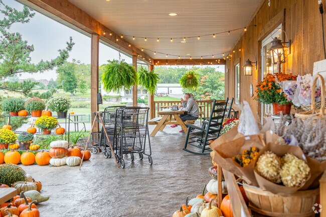 Enjoy an ice cream treat and farm view on the porch at Patches Family Creamery in South Lebanon.