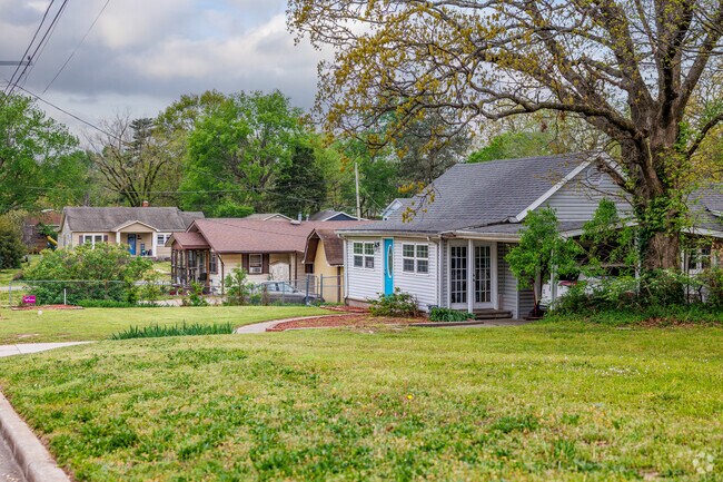 Older homes line a residential street in Jackson Hills.