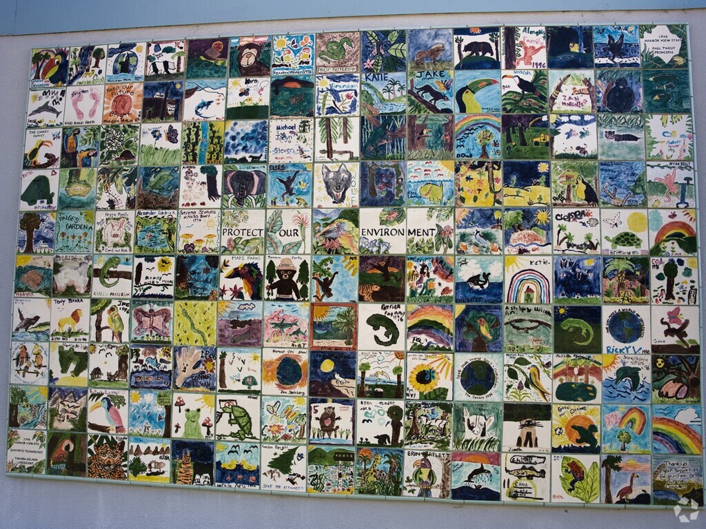 An art wall at Harbor View Elementary School shows the students' dedication to the environment.