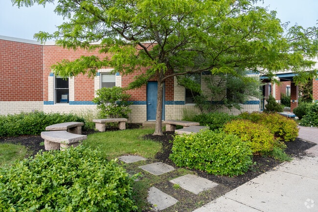 Sitting area outside the main entrance to the Dora L. Small Elementary School.