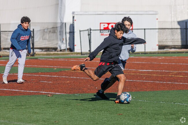 Play a game of soccer on the turf field at Patterson Park, near Upper Fells Point.