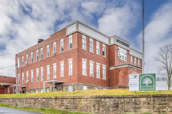 An old school has been repurposed into the Woodburn Community Complex housing some non-profits.