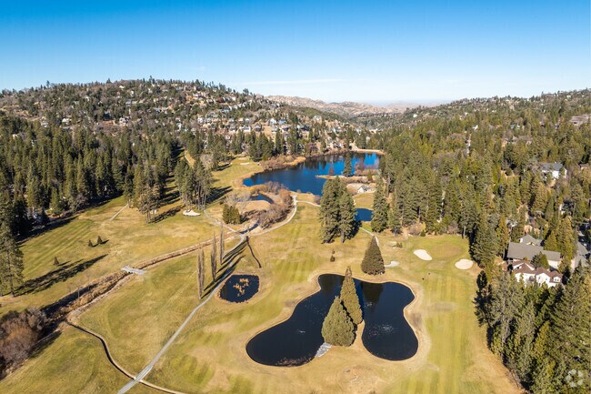 Lake Arrowhead Country Club offers tennis and golf with 9 challenging back holes.