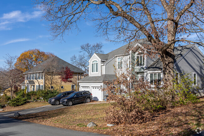 Homes in Grove Street include large single family homes with private driveways.