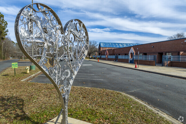 Sculpture at Greenway Park Elementary campus entrance.