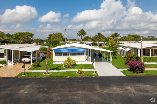 Experience the charm of mobile home living tailored for 55+ residents at Highland Meadows