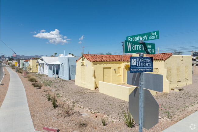 Historic rainbow bungalows sit along Broadway Boulevard, welcoming people to Rincon Heights.