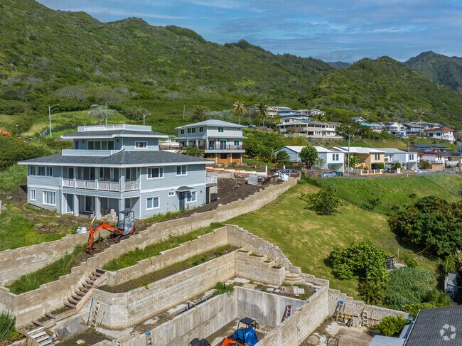 The homes are built on the hills with clever engineering in Kuli'ou'ou-Kalani Iki, HI.