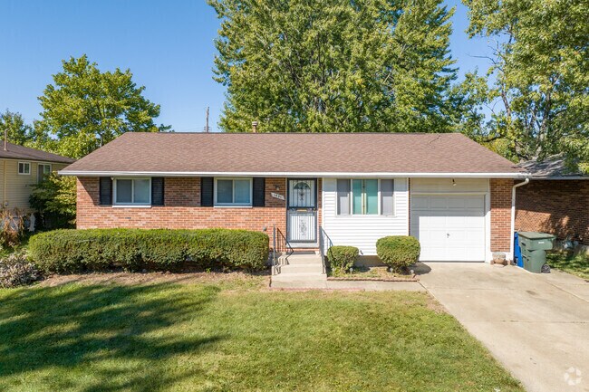 A single-story, Ranch-style home with a single car garage in Milbrook.