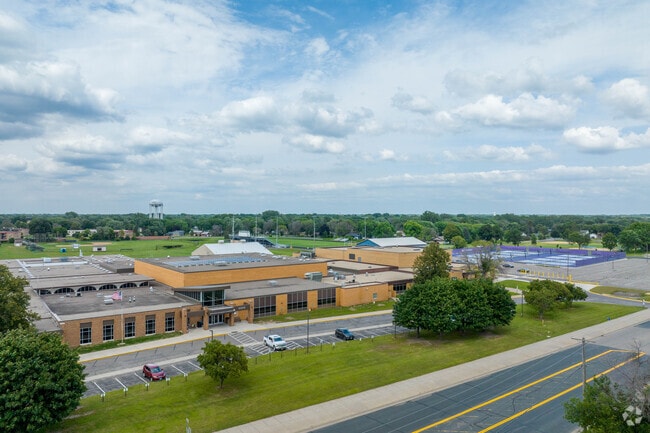 Students at Brooklyn Center Middle and High School develop academic skills and personal growth through rigorous curriculum, extracurricular activities, and supportive staff guidance.