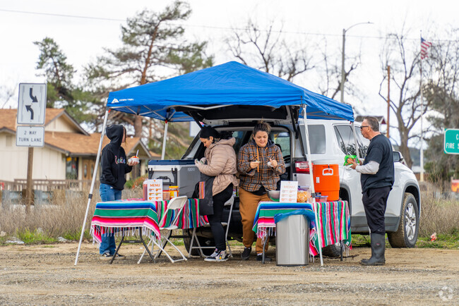 Experience the flavors of local cuisine at a street food vendor in Lake Riverside.