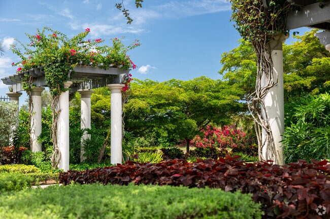 Mediterra features beautiful landscaping and grounds inspired by the Mediterranean style.