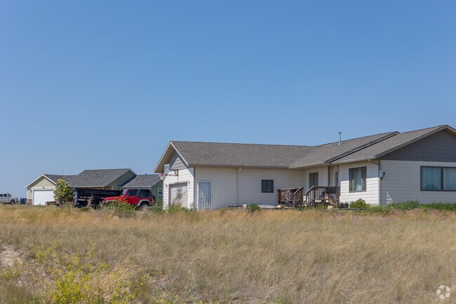 Ranch houses can be found in a residential development in Birdseye.
