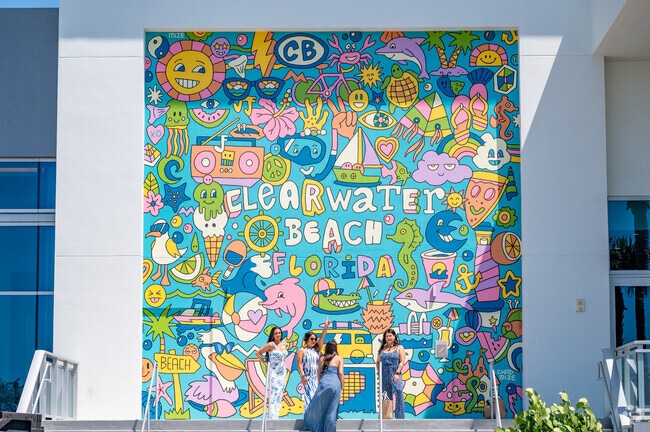Tourists and University Park locals visit Clearwater Beach for its colorful atmosphere.