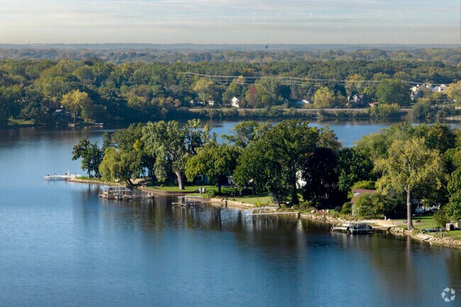 Private boat docks lace the shores of Long Lake on these scenic peninsula.