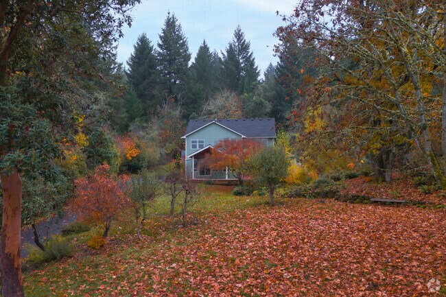 Two-story farm style homes can be found on several acres around Salem Hills land.