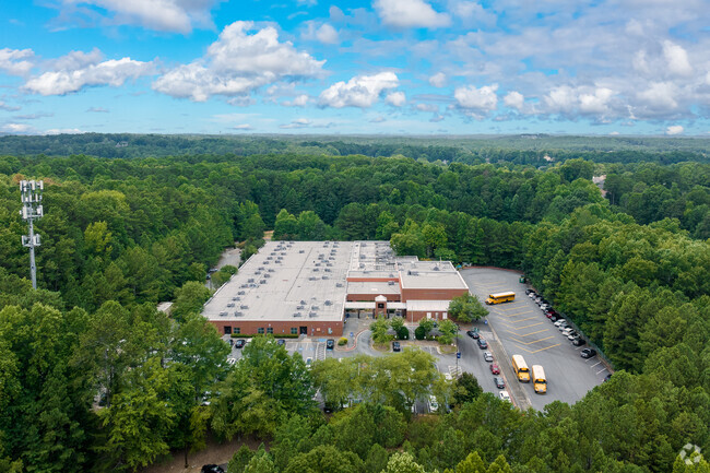 Secluded in the woods, Ford Elementary School offers a peaceful location for teaching.