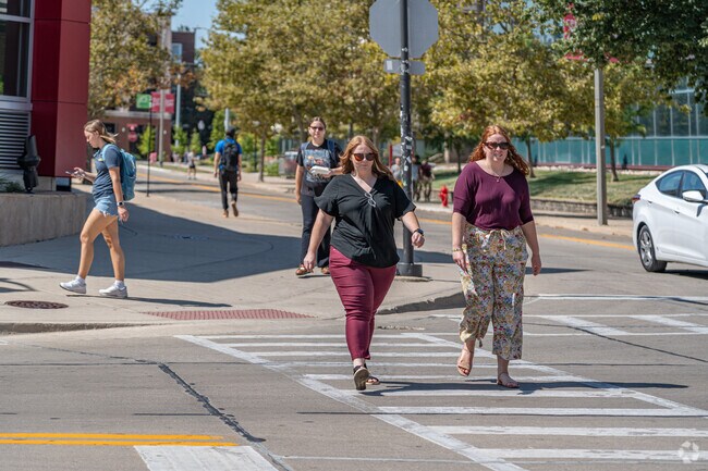 Residents of Old North Normal enjoy plenty of sidewalk space for walking or running.