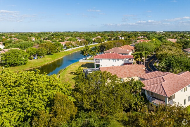 The Walnut Creek gated community is filled with lush greenery.