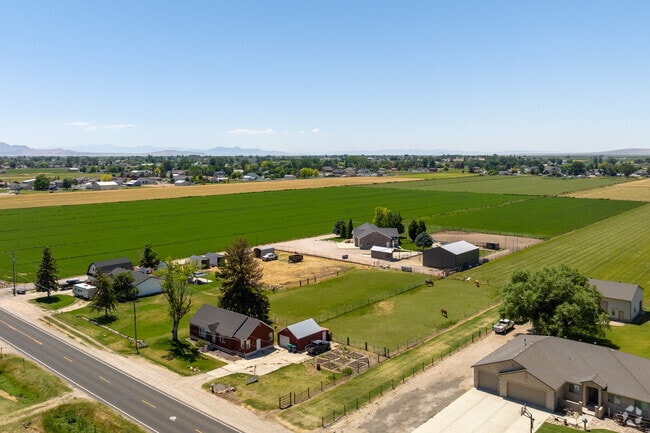 Homes on large lots next to fields in Hooper.