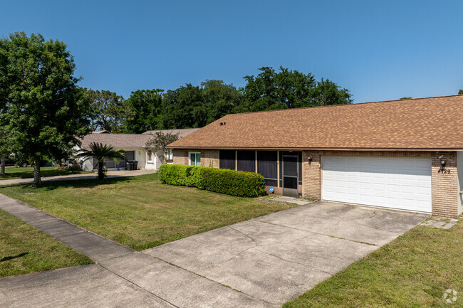 Hidden Lake contains brick front homes with oversized garages.