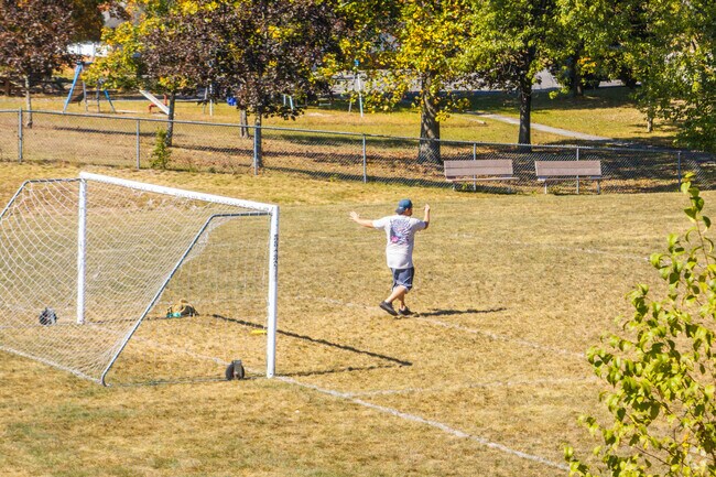 A local practices his disc golf game on the sports field at Auburn Memorial Park.