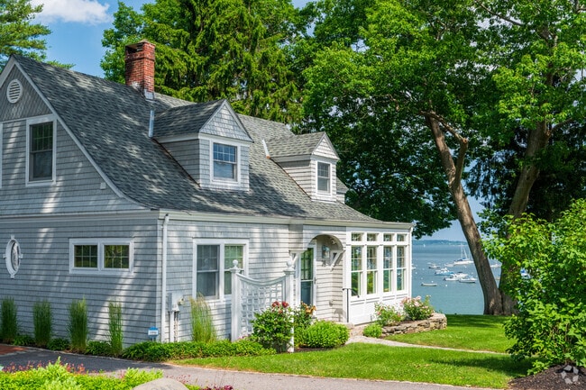 Many Cape-style houses in Cumberland Foreside overlook the bay’s rocky shoreline.
