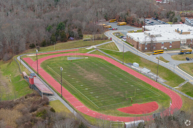 The football field and track at The Joseph Case High School in Swansea is a well kept field.