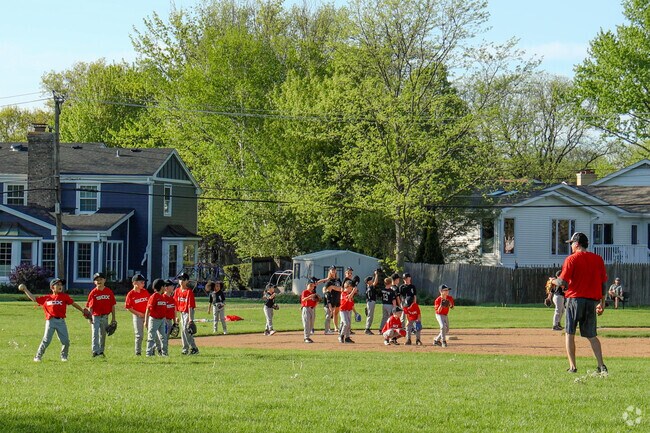 The soccer and baseball fields used by local sports leagues in late afternoons.