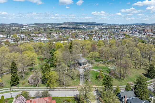 Farquhar Park is an expansive 20.5-acre park that offers a serene ambiance with its woods and walking path.