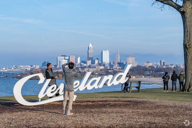 The panoramic views at Edgewater's Cleveland Script Sign draws visitors daily.