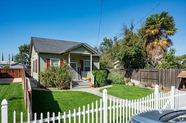 A picket fence frames this cute single-story home in Elmira.