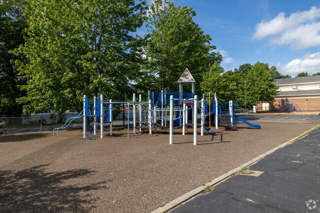 A robust play structure sits on the grounds of Louis A. Conley School in Whitman.