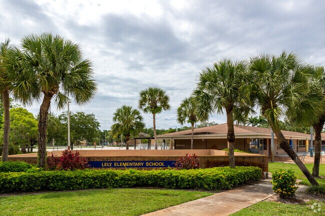 Lely Elementary School in Naples welcomes students with a large sign and attractive landscaping.
