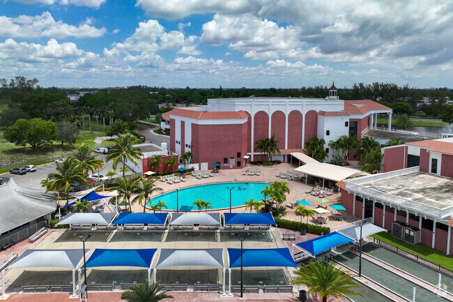 Century Village Club house with beautiful pool  in West Deerfield Beach neighborhood.