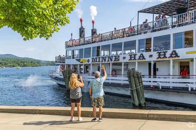 The iconic Minne Ha-Ha steamboat offers scenic cruises on Lake George, passing through Bolton.