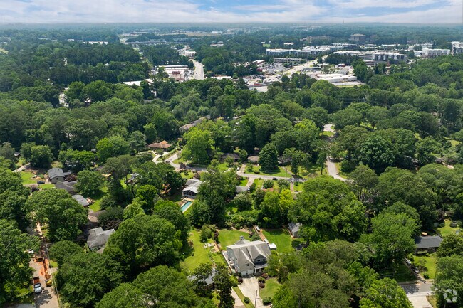 Aerial views reveal the green, suburban layout of Lindmoor Woods–Valley Brook Estates, nestled conveniently inside the perimeter with quick access to highways.