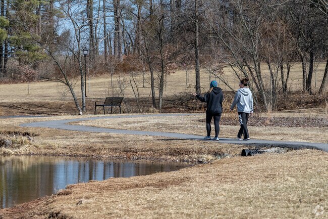 Stroll on a walking path with a friend in Taneytown.