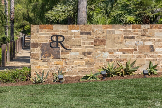 One of the entrances to the Baker Ranch planned community is marked with the signature logo.