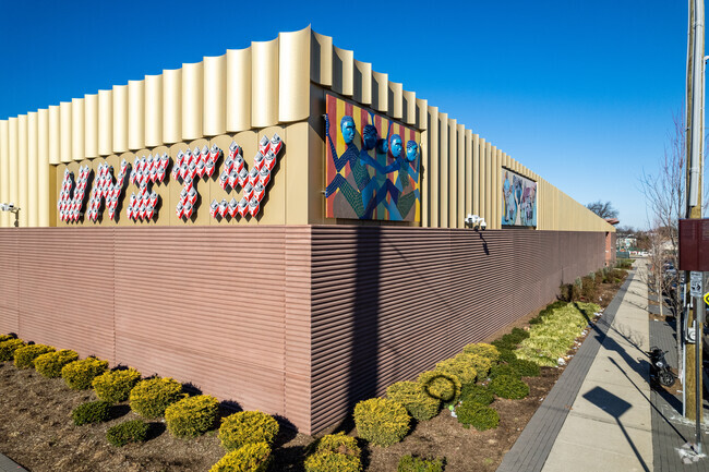 Southeast corner of the The Fairmount Heights Switching Station showing public art.