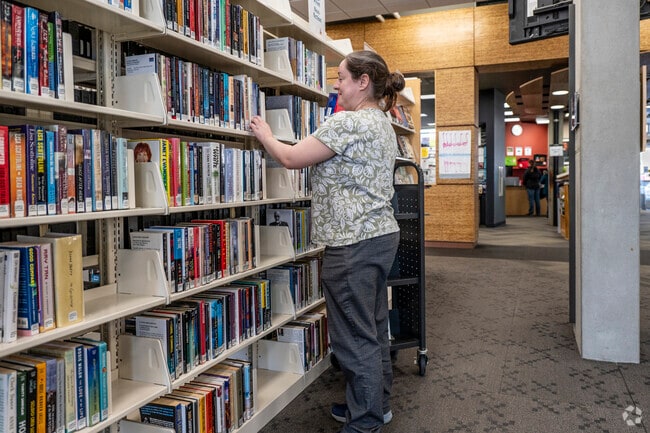 The staff at Sequoya Library in Midvale Heights is always ready to help patrons find titles.