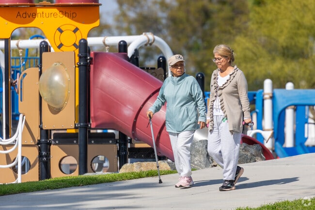 A lovely walking path at Delhi Park offers serene strolls through the heart of the neighborhood.