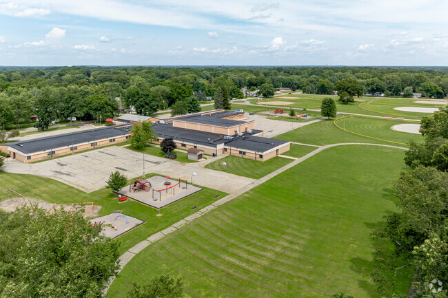 Townsend Elementary School features a wide place area including open fields and a walking path.