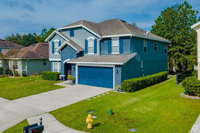 This spacious American foursquare is located in Deer Creek, Florida.