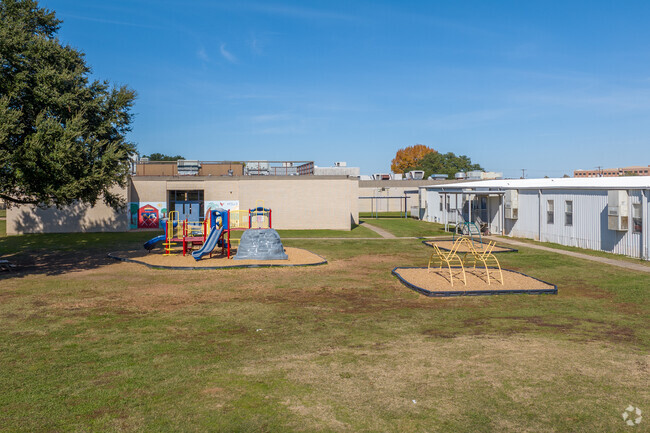 Students at Apollo enjoy the playground.