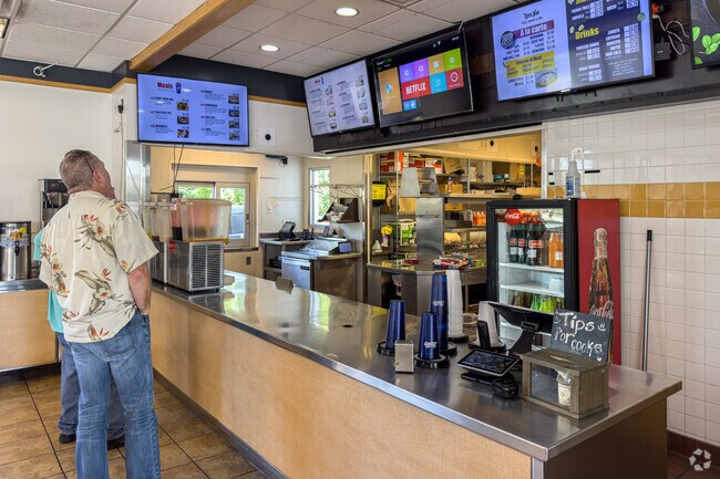 Boss Man Tacos, Burritos, & More is located at Pleasant Crossing and I-49 in Lowell.