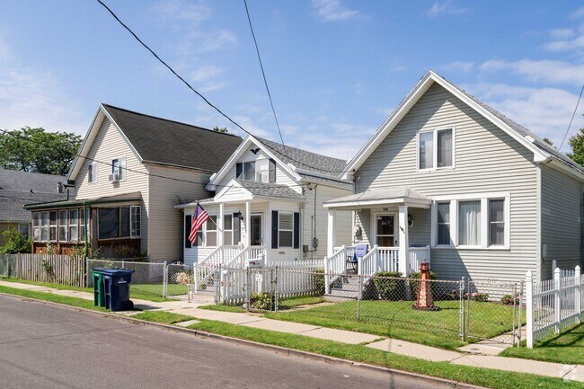 Homes in First Ward often have porches or sunrooms in the front.