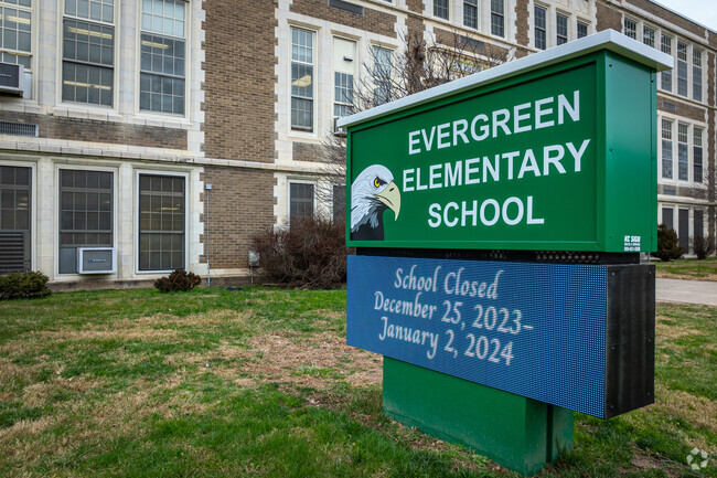 Roadside signage for Evergreen Elementary School features their eagle mascot, in Plainfield, NJ.